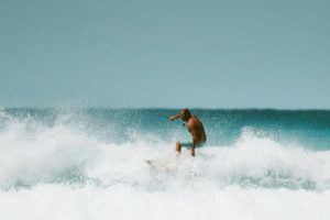 A man surfing in the water