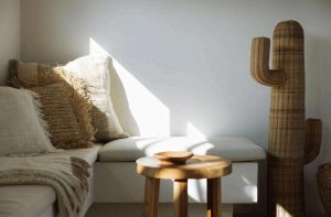 A cozy corner of the room featuring a boho-chic (Bohemian) interior design concept at Kavo Maison