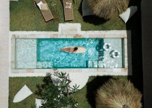 The central pool area at the Kavo Maison Surf & Yoga Camp in Munggu, Bali