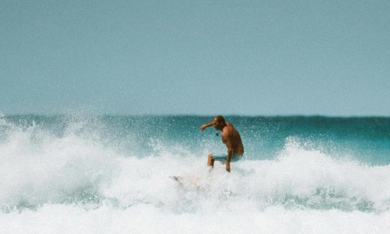 A man surfing in the water