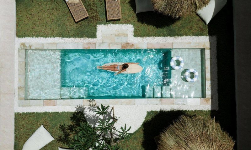 The central pool area at the Kavo Maison Surf & Yoga Camp in Munggu, Bali